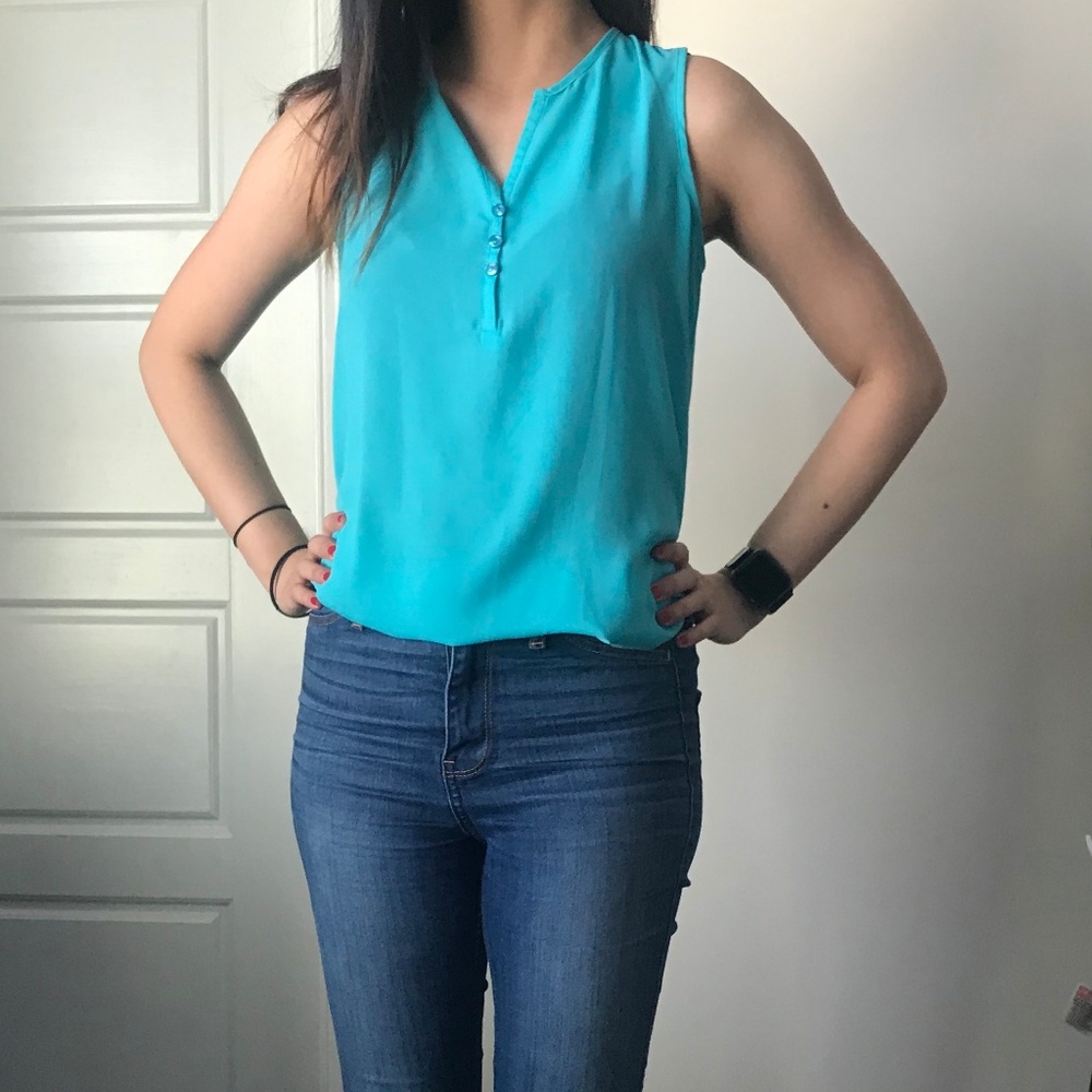 Teal sleeveless blouse